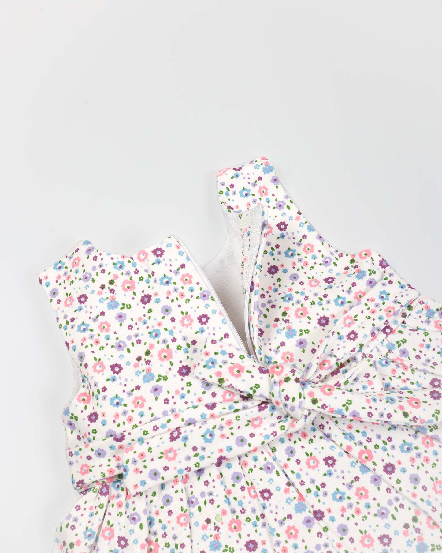 Allover Floral Printed Frock With Bow Straw Bag
