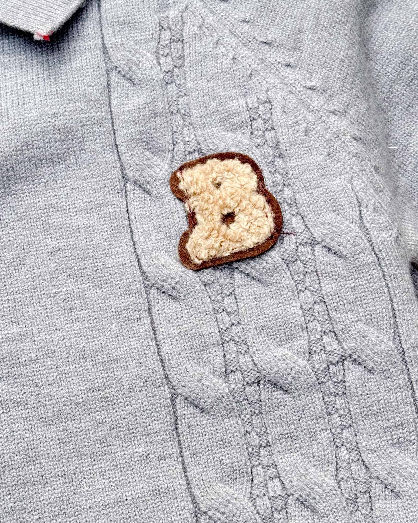 B Appliqued Fleeced Cable Knit Sweater Romper