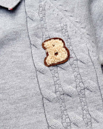 B Appliqued Fleeced Cable Knit Sweater Romper
